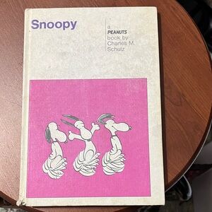 Snoopy Book by Charles M. Schulz - Purple Cover